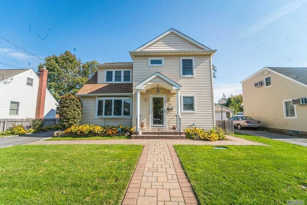 Welcome To This Stunning Colonial In Hicksville.