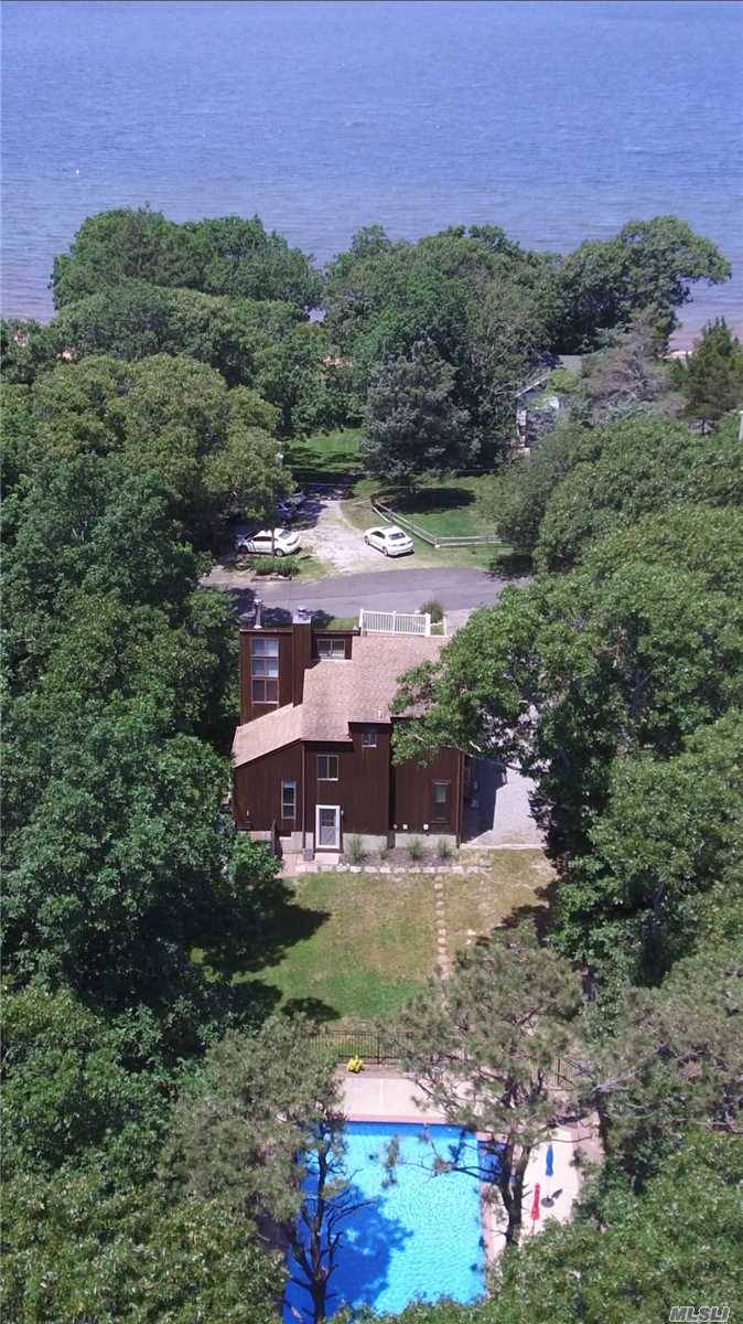 Quintessential Beach House fully furnished With Spectacular Water Views Of Peconic Bay.