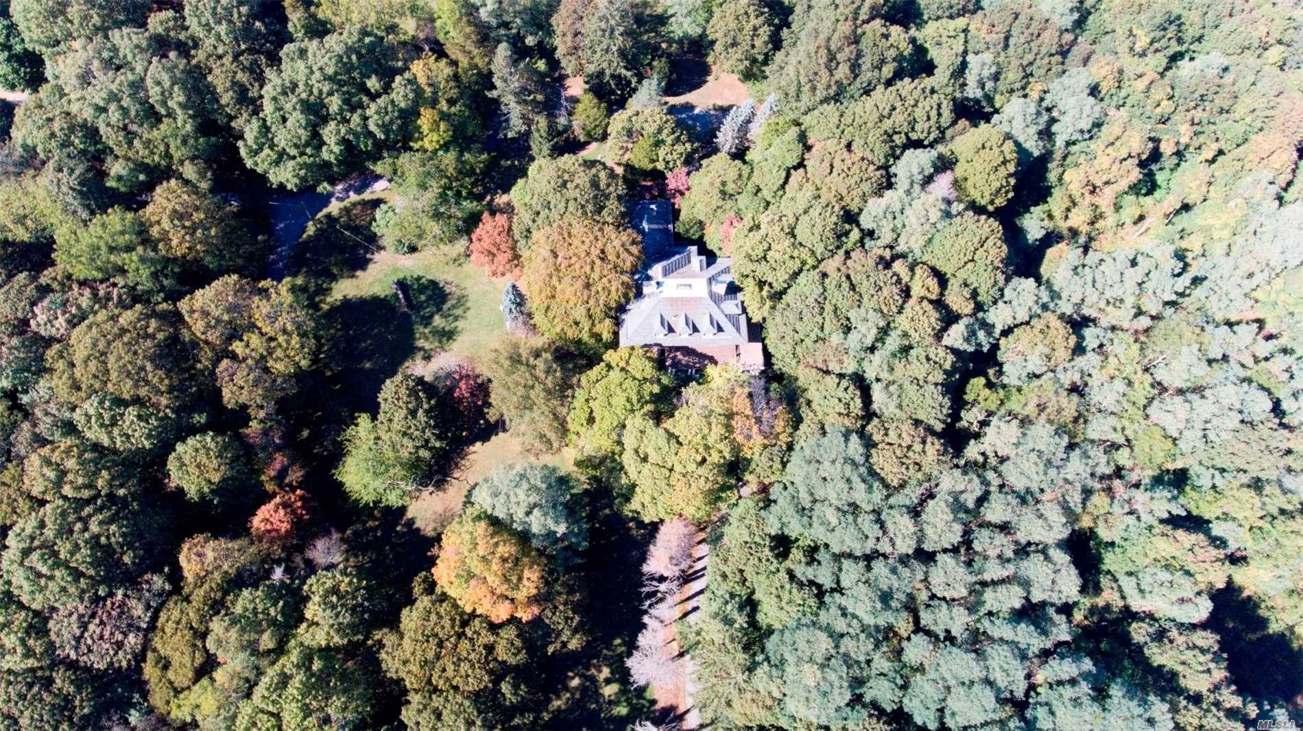 27. 63 Acres In The Hamlet Of Fort Salonga Conveniently Located 1 Hour From NYC Hamptons A Rare Opportunity With Possible Subdivision Two Separate Tax Lots Zoned 1 Acre Residential.