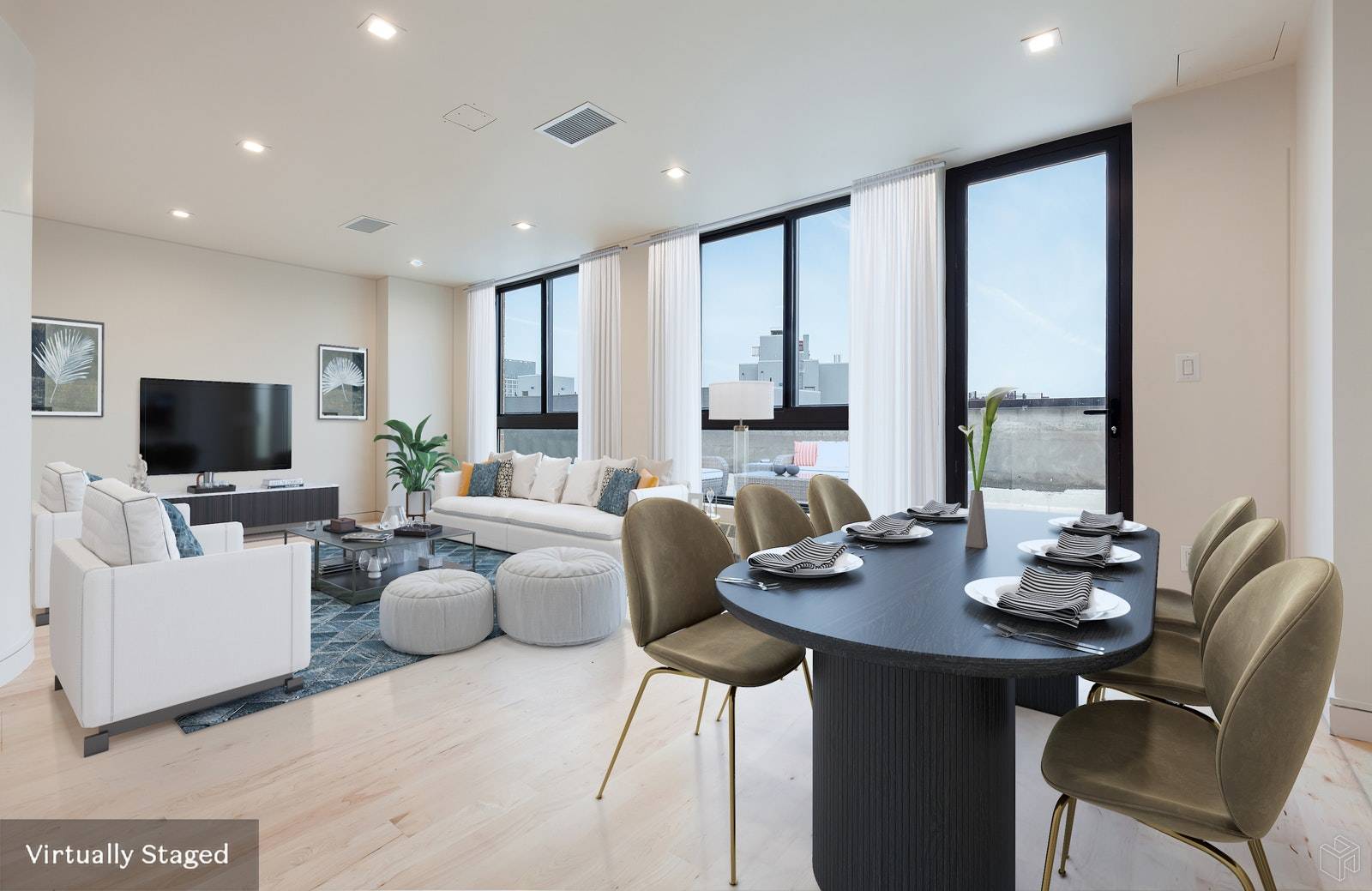 Unit 5B is a 1095 square foot penthouse with private balcony and roof terrace.