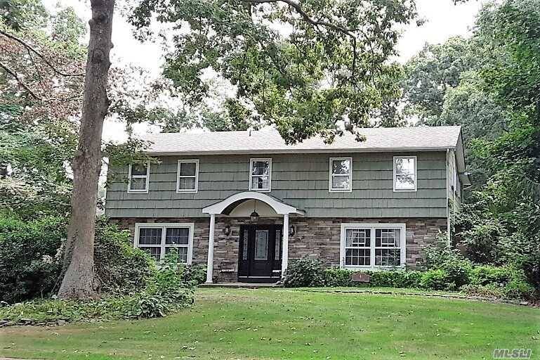 Lovely Colonial Splanch Features Formal Living Room 4 Skyiights Open To Large Den W Fireplace, EIK Features Warm Maple Cab W Granite Ss Appl, Travertine Flooring In Foyer Kitchen.