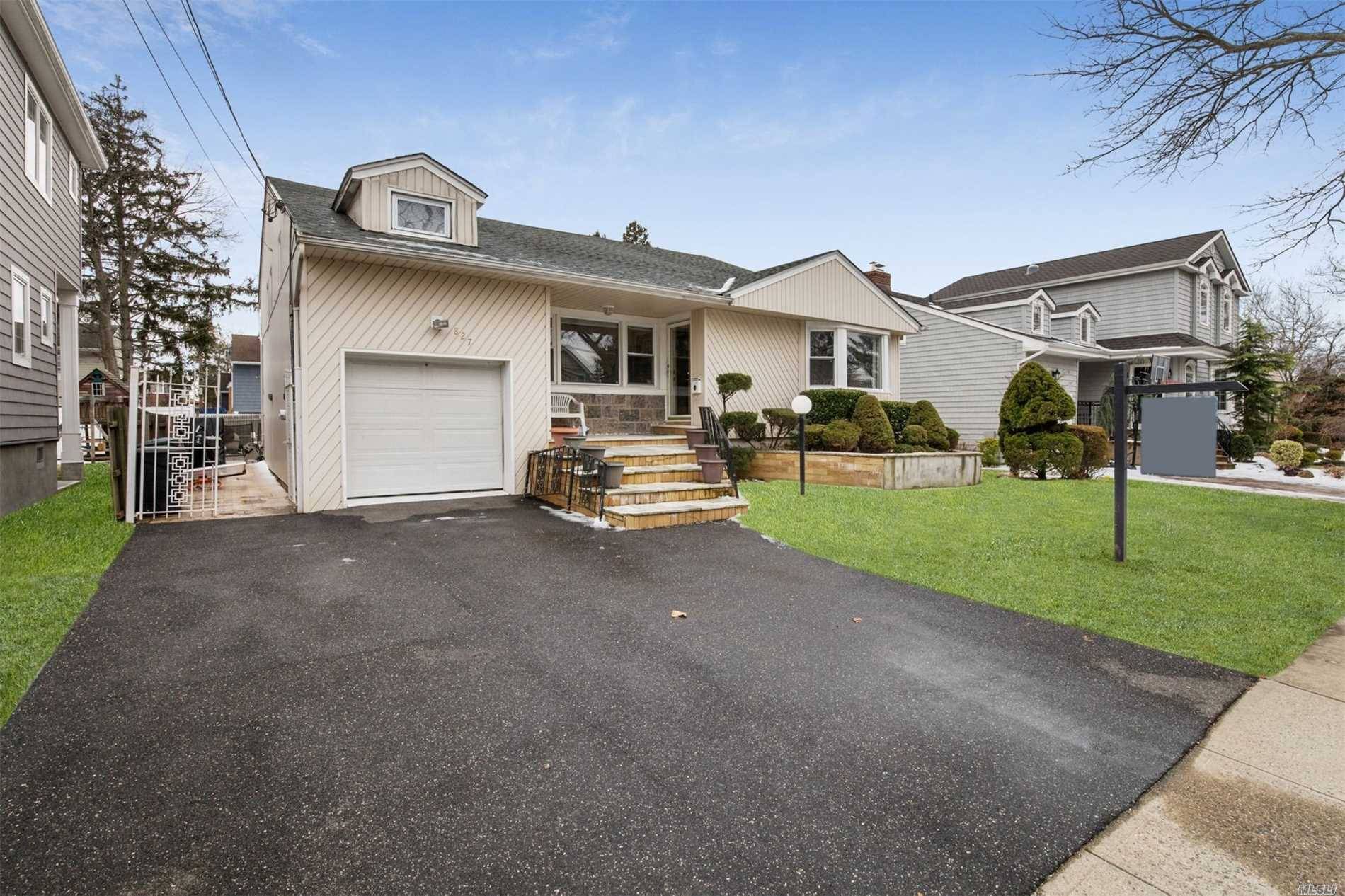 Spacious Split Located In The Heart Of Woodmere.