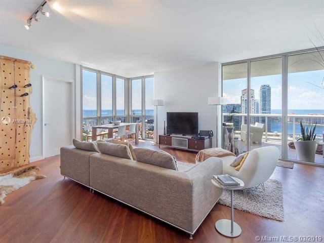 Enjoy breathtaking views from the 24th floor of this lower penthouse corner unit at Murano Grande in South Beach