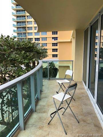 MODERN KITCHEN WITH LAUNDRY - WAVE CONDO 2 BR Condo Hollywood Florida