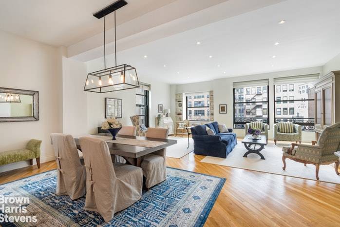 Huge windows, exceptional light, spectacular NoMad views including the Empire State Building right out the living room window in this fully renovated, exquisitely appointed, sunny duplex loft located at the ...