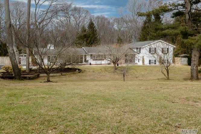 Impeccable Condition, This Atypical 5BR Split Ranch Is Totally Renovated, Set On 2 Very Private Tranquil Acres.