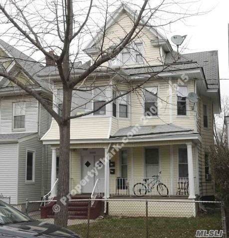 Large detached three family property on 91 05 97th Street in Woodhaven, Queens for sale.