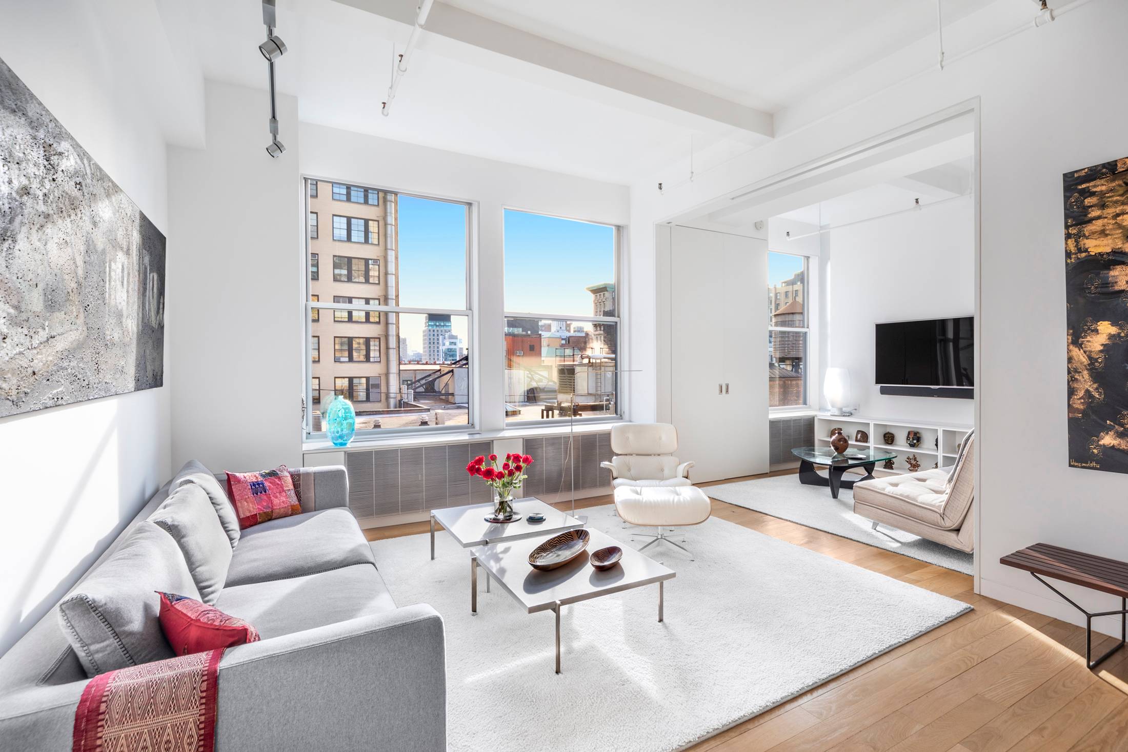 This beautifully renovated, chic, Pre War Loft features stunning custom finishes and the perfect layout all designed by famed architect, Audrey Matlock.