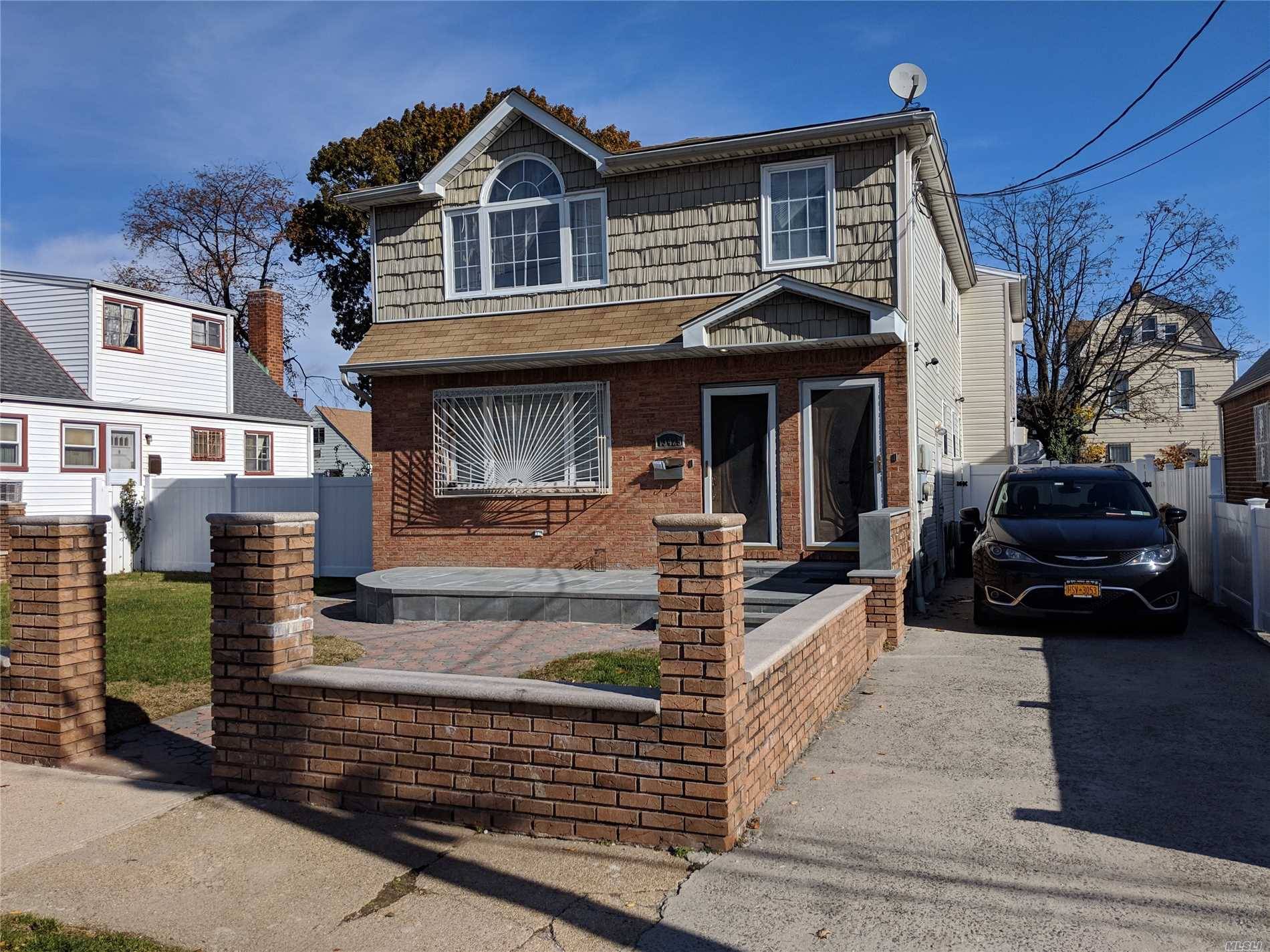 Detached 2 Family House With A Large Backyard And Private Driveway For 3 Car Parking Spaces.