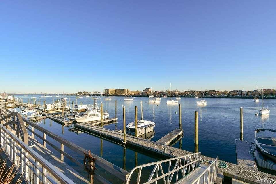 Located In A Luxury Mediterranean Architectural Waterfront Gated Community this 2, 200 SqFt Triplex Condo Features 2 Spacious Bedrooms with En Suites, Gourmet Chef's Kitchen, Hardwood Floors, Central Air, Full ...