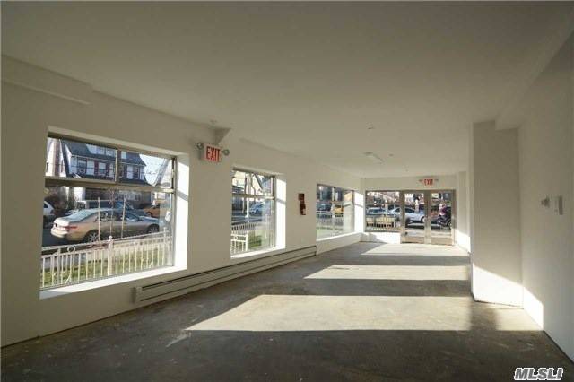 Commercial Duplex Facility Situated On The Street Level Of A Luxury Condominium Building In The Sought After Section Of Jamaica Estates !
