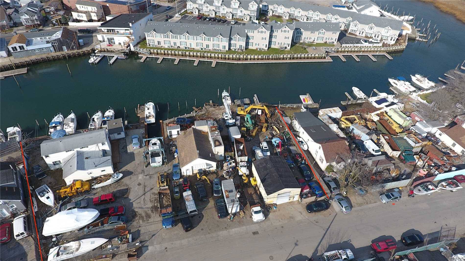 Marina Facility, Residential Property, Mechanic Shop And Vacant Land.