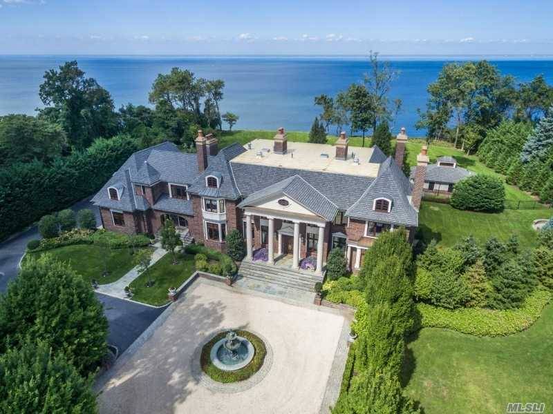 This Majestic Brick Manor Waterfront Estate Nestled On 3.