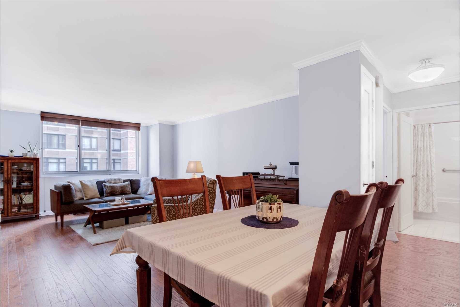 Large updated luxury 1BR apartment w newly added finishes throughout rich plank flooring, inset doors w new door hardware, skim coated ceiling with classic crown molding, new lighting fixtures, and ...