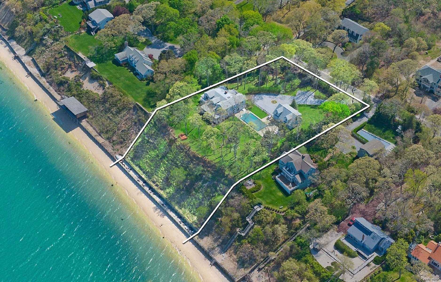 Rare, Double wide lot. 205' frontage beach on Peconic Bay.