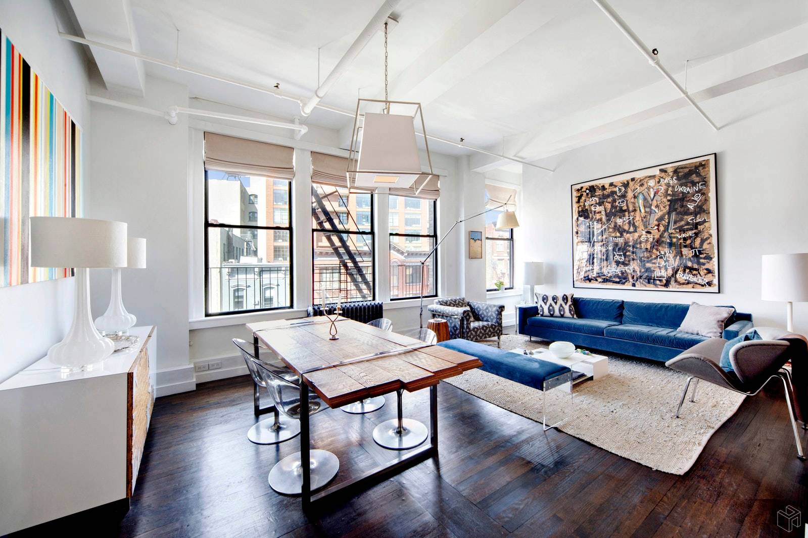 This wide and light filled 1, 700 square foot loft is located right at the crossroads of Soho and Nolita and offers spacious rooms and a sensible split bedroom layout.