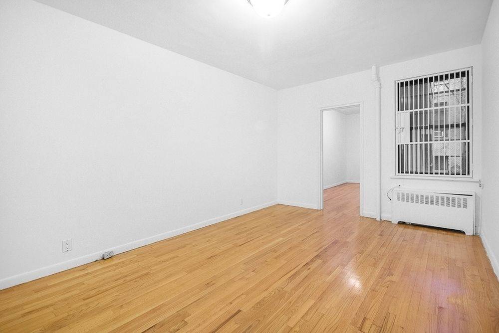Spacious 1 bedroom in elevator building in the heart of the Upper East Side featuring Eat In Kitchen, Granite Counter tops, and White Cabinets, Tons of closets, and hardwood floors ...