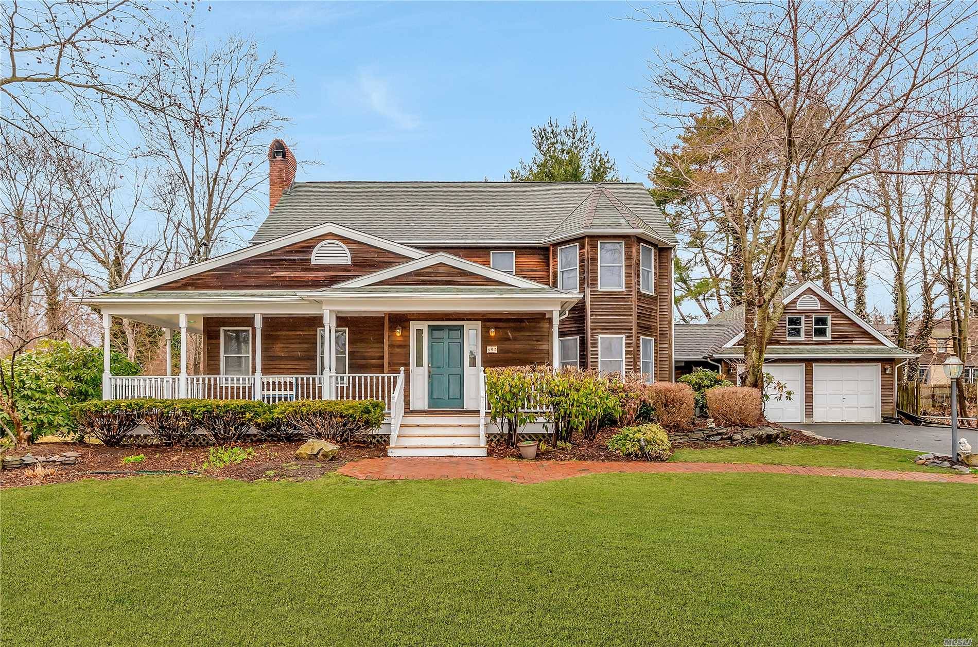 Some Photos Virtually Staged Immaculate Maintained Home Nestled in the Idle Hour Area featuring an Expansive Wrap A Round Porch.