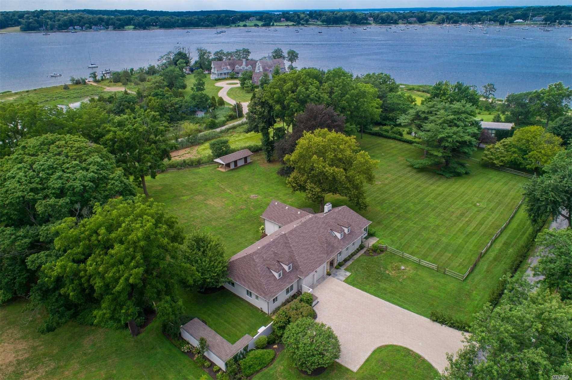 MAJOR REDUCTION ! Panoramic Views Over The Harbour In This Beautiful European Farm Ranch In The Prestigious Village of Cove Neck.