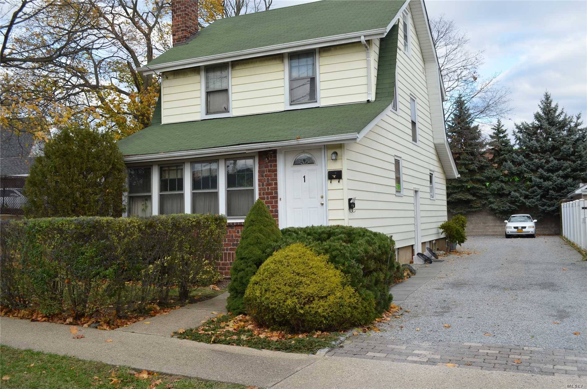 Spacious Colonial with Endless Possibilities on an Oversized Lot Featuring Three Bedrooms, Two Full Bathrooms and a Large Bonus Room.