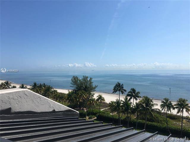 DIRECT OCEAN VIEWS FROM THIS STUNNING KEY COLONY SLOPE APARTMENT