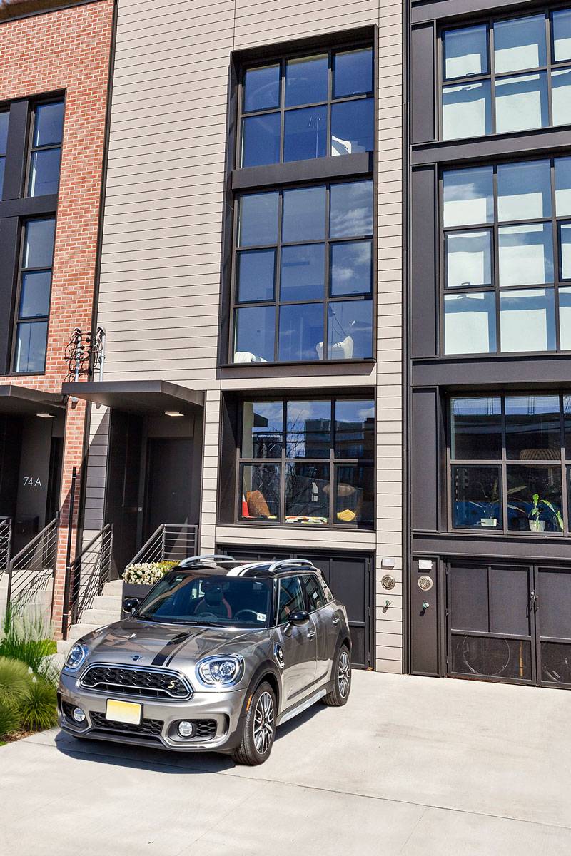 Classic design and thoughtful, modern touches seamlessly come together in this spacious, elegant townhome nestled beside Red Hook's storied waterfront.