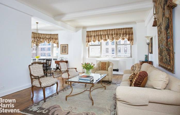 Enter this sunny, elegant and spacious 12th floor Park Avenue prewar two bedroom, two and a half bath home from a semi private elevator landing and prepare to be charmed.