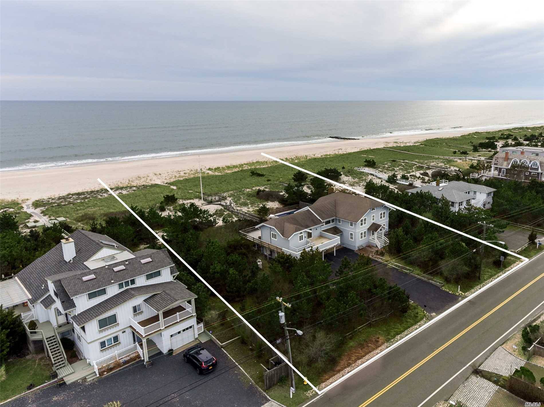Large Westhampton Beach Ocean Front Excellent Investment 140'ft ocean frontage 6 Bedrooms 3.