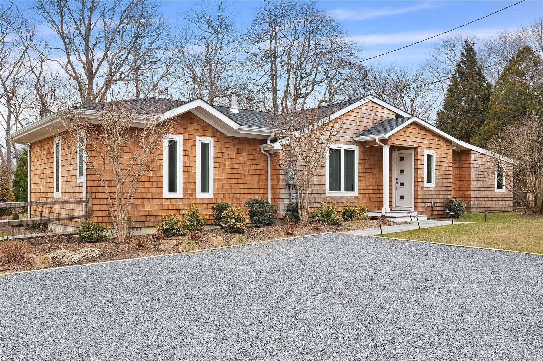 Enjoy the close proximity to East Hampton Village from this completely renovated four bedroom four bathroom modern cottage with finished basement.