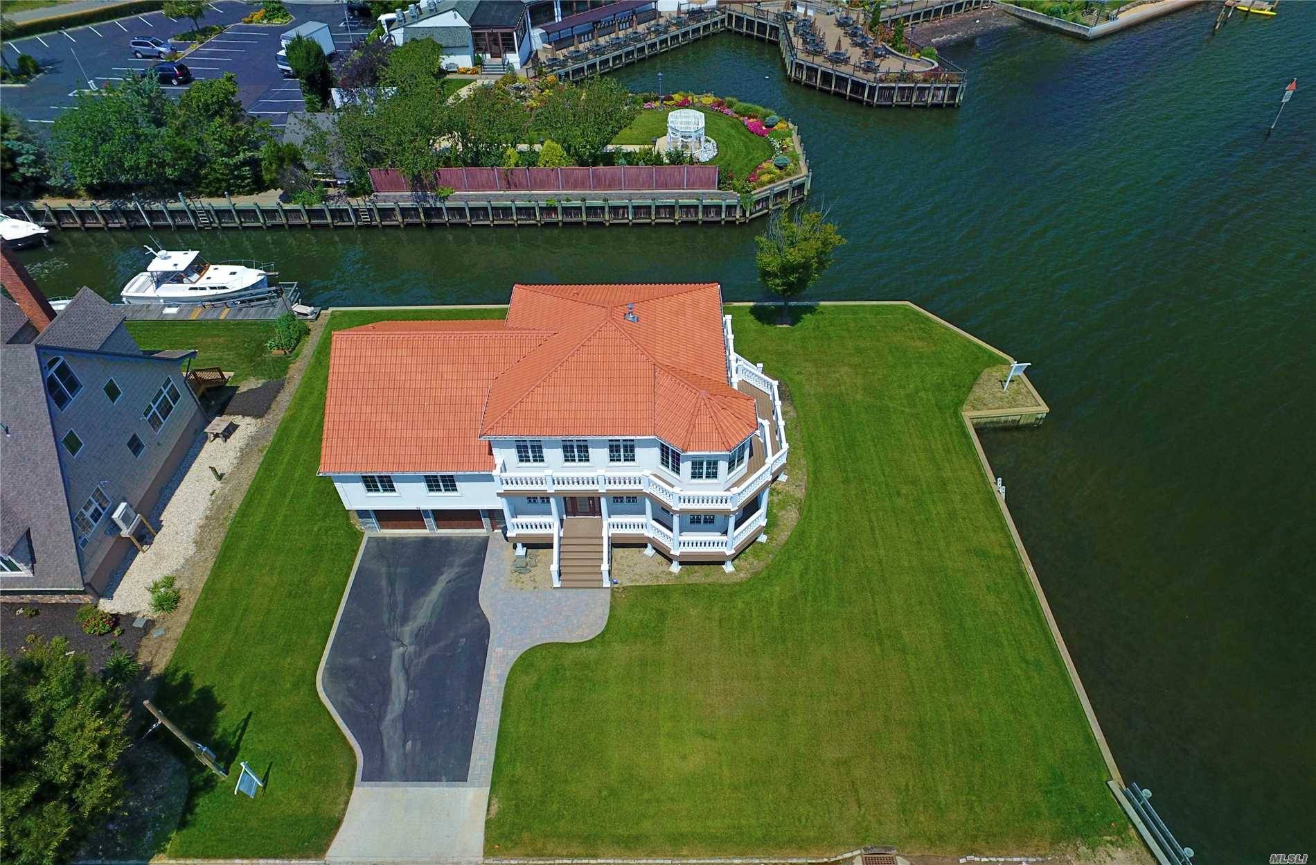 Stunning Waterfront, New Construction, Has Been Elevated 11 Feet Built To Fema Codes.