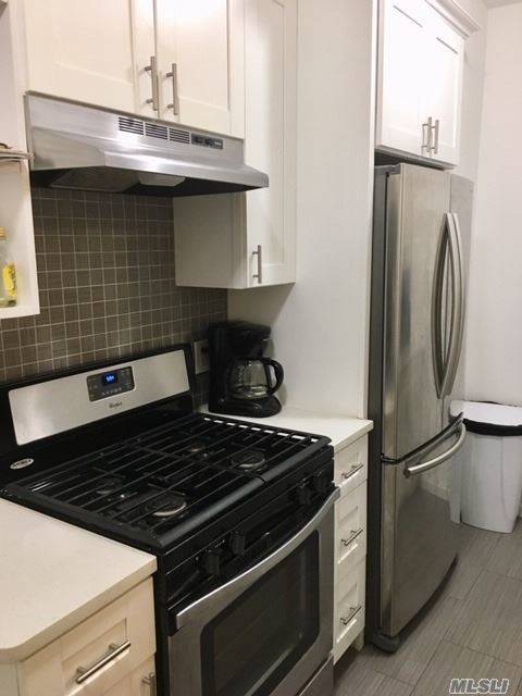 Beautifully renovated Studio turned into a one bedroom condo in an elevator building Close to Long Island Railroad and Subway Train Hardwood floors, Open modern kitchen living room floor plan.