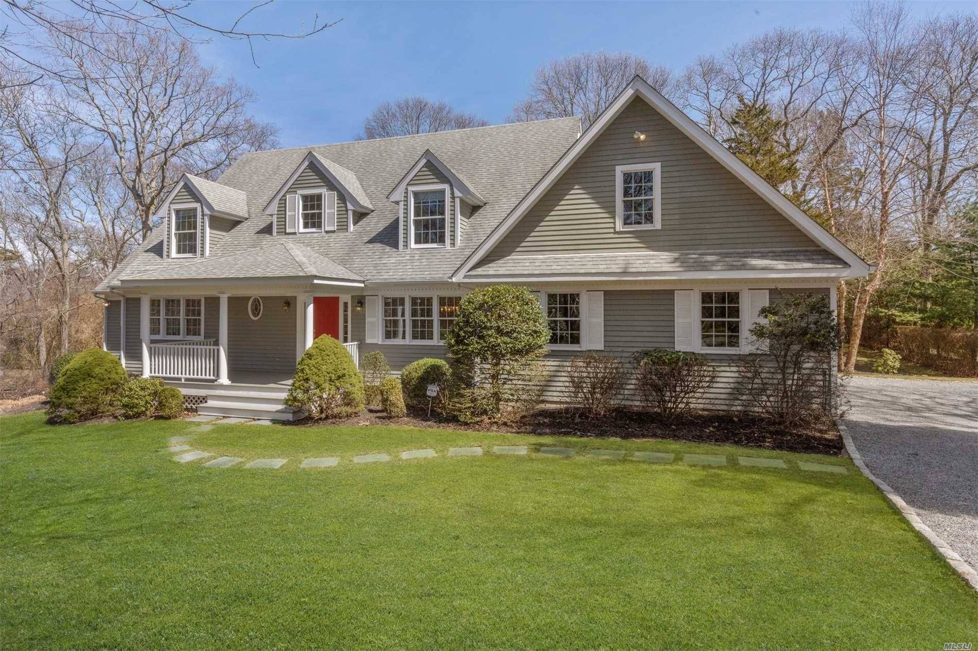 A Stylish four bedroom, two and one half bath, large Cape set in a tranquil waterfront community on almost an acre of Land in the Noyack area of Sag Harbor.