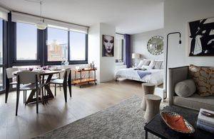 Spacious Alcove Studio Featuring Floor to Ceiling Windows and Contemporary Finishes in Tribeca