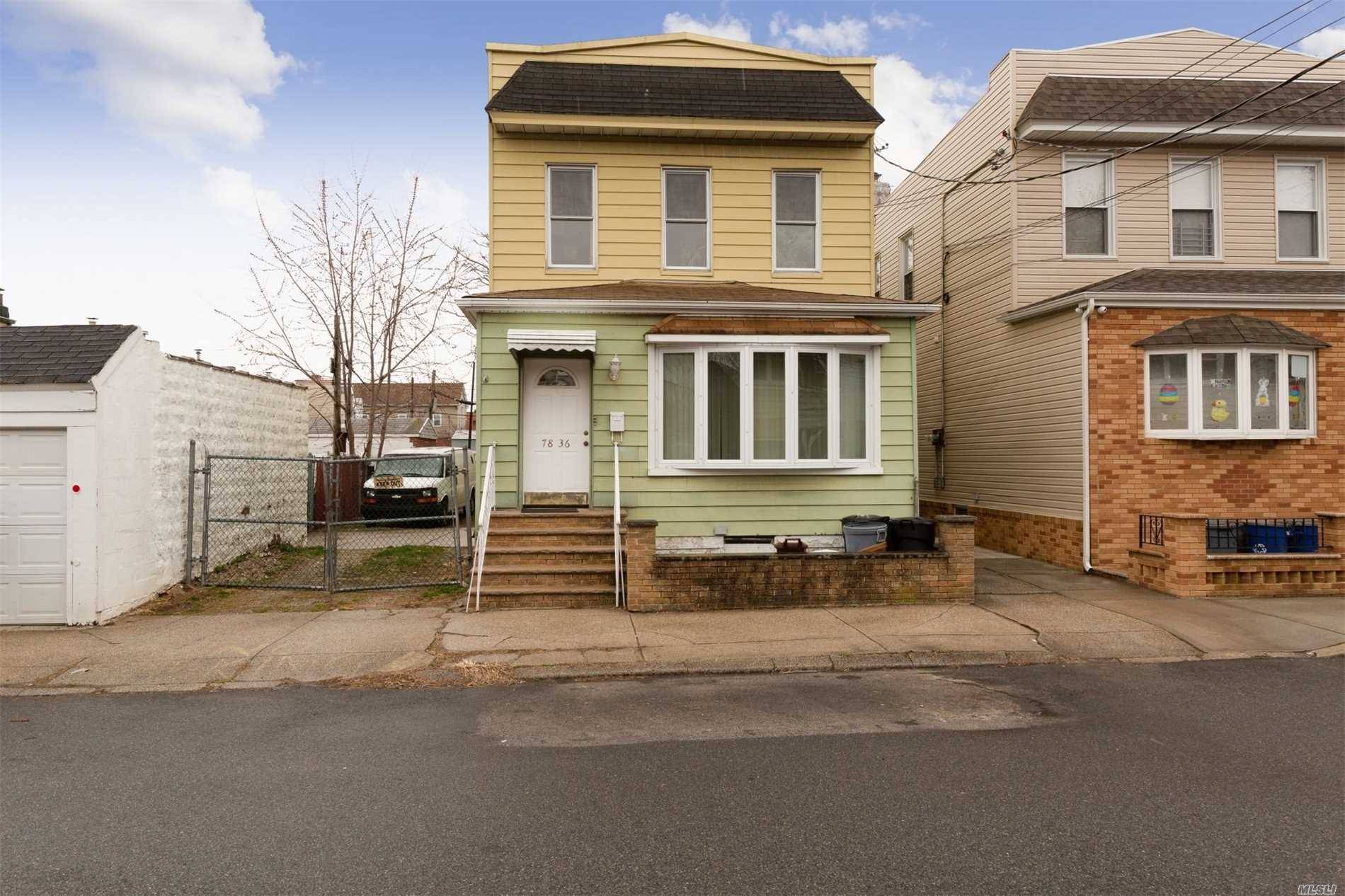 Rare Detached 2 Family Home in Middle Village near public transportation and shopping.