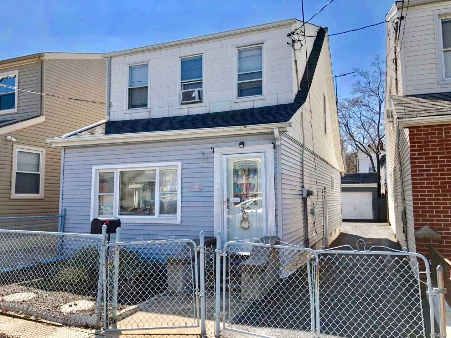 Legal 2 Family Detached House In The Heart Of Maspeth, Private Driveway With 2 Parking Garages In The Rear Of The House.