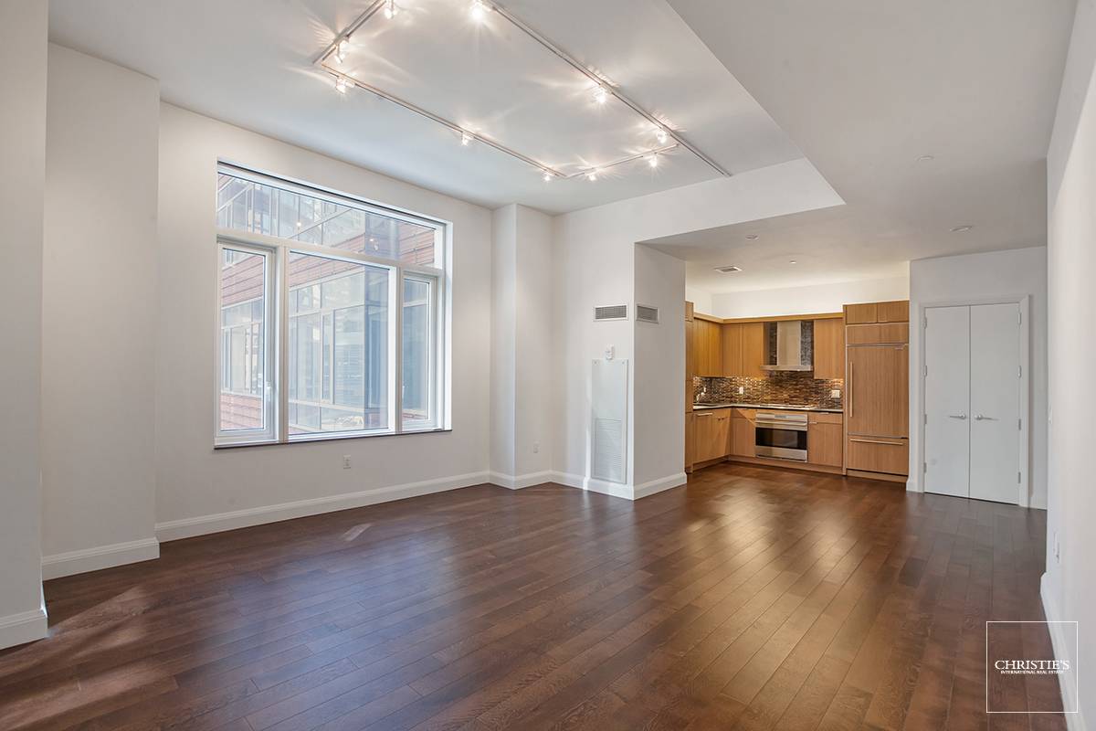 Convertible Two Bedroom Home with Room to Grow This pristine one bedroom home at the Pelli designed condominium has 11' high ceilings and oversized windows offering a sense of spaciousness ...