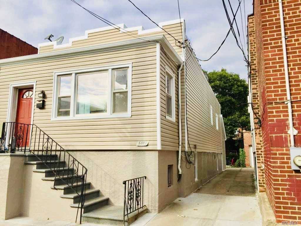 Hi Ranch House For Sale. Home Features Updated Eat In Kitchen, 3 Bedroom 2 Baths, Hardwood Floors, 2 Steps Down Street Level Basement With Separate Entrance.