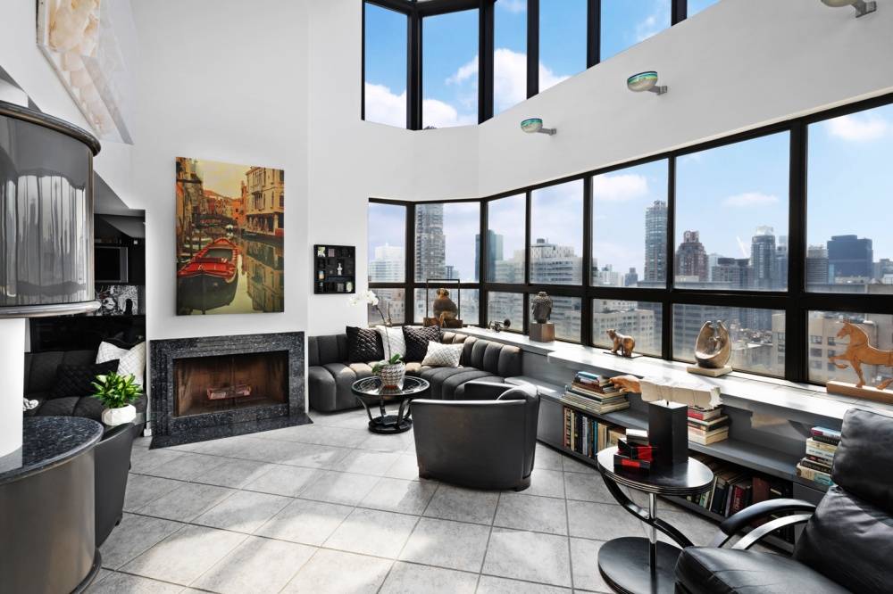 This Penthouse 3 Bedroom Duplex condo incorporates fabulous architectural elements including 3 terraces, north, south and west views of Central Park.