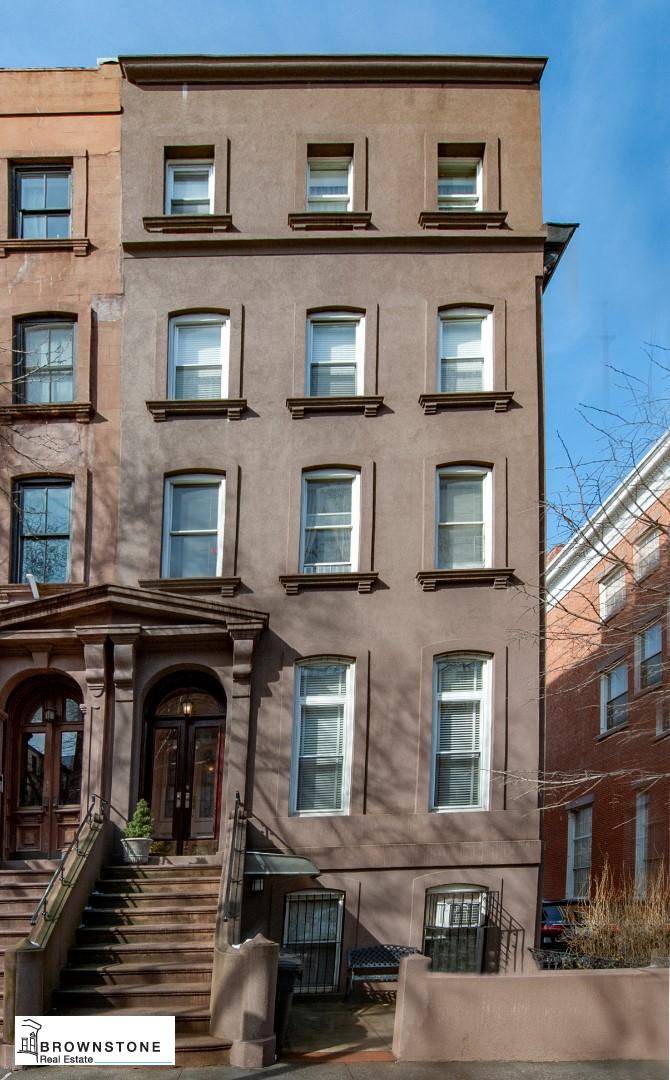 We are very excited to represent this magnificent, 22' wide corner property in Carroll Gardens.