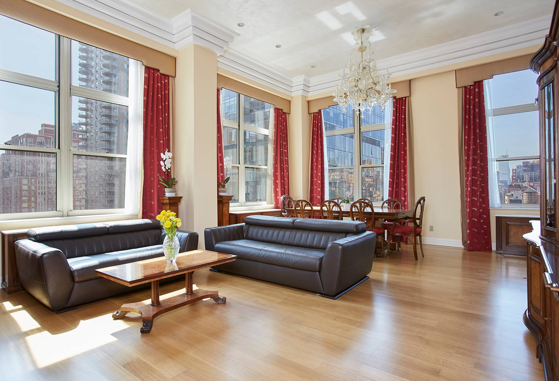 Grand and sunny corner home in triple mint condition, located in a premier Upper East Side condominium.