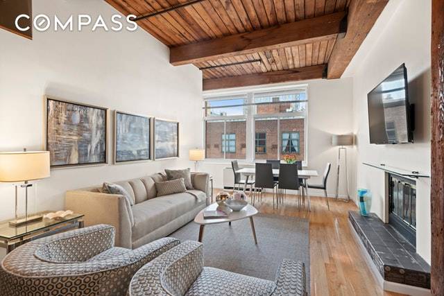 This sprawling three bedroom, two bathroom condo on a tree lined block in prime Gramercy offers incredibly rare 11'6 wood beamed ceilings, two wood burning fireplaces, oversized windows with bright ...