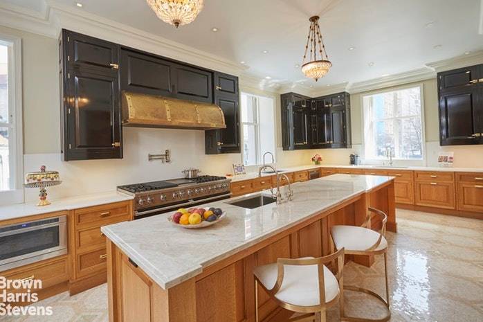 Impeccably renovated 6, 110 square foot condo is perfect for the buyer seeking the space of a townhouse in a full service, historically iconic building.