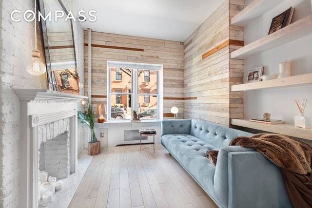 Fall in love with this elegant duplex on one of West Chelsea s most sought after treelined blocks.
