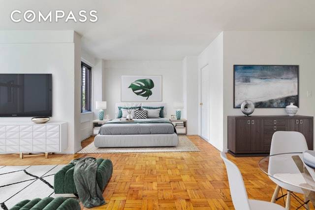 Perfect opportunity to live in a BRIGHT and BIG alcove studio at 166 East 61st Street with the ability to convert it into a one bedroom.