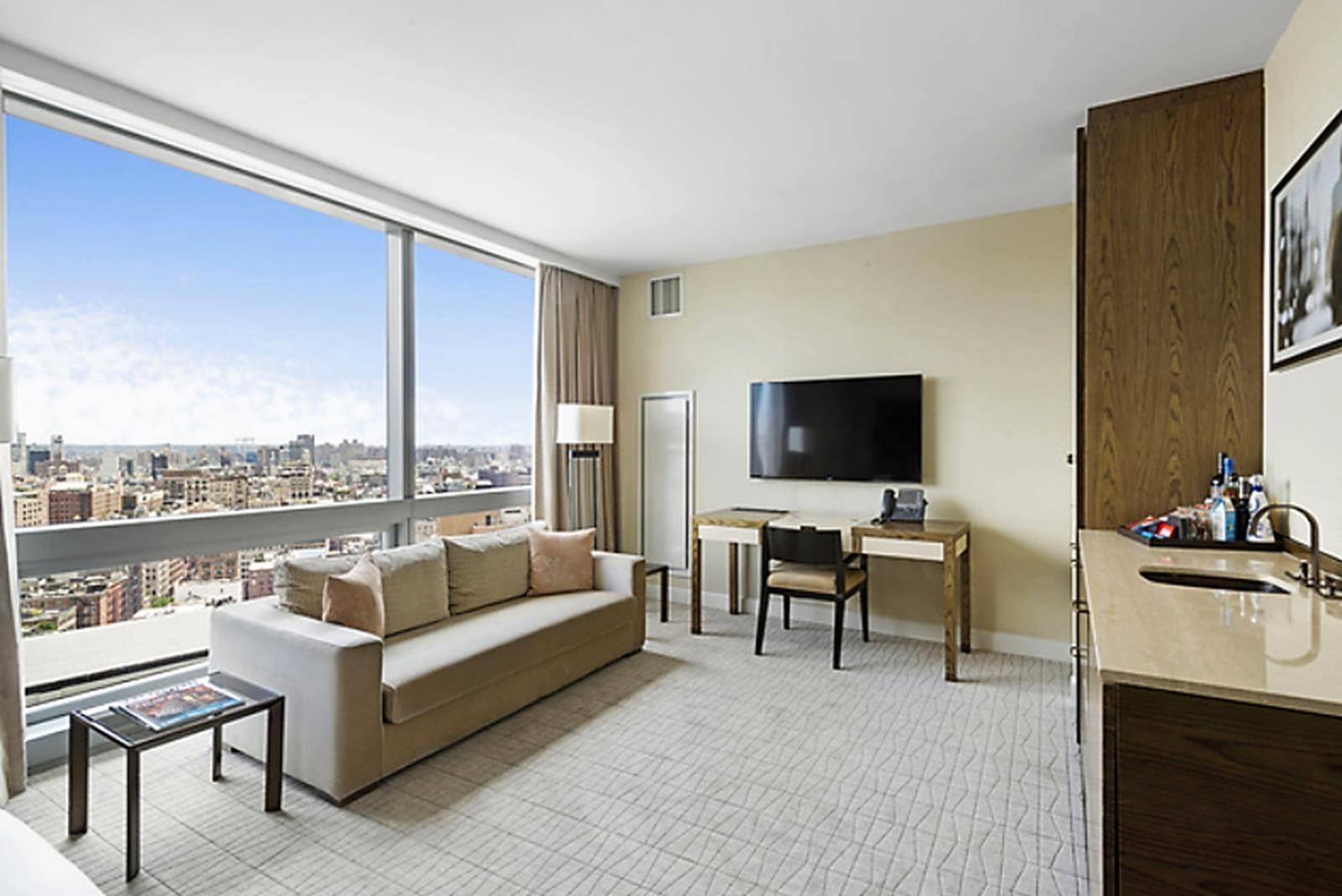 A high floor, premium view, fully furnished, one bedroom corner suite resale at the Trump SoHo Hotel Condominium.