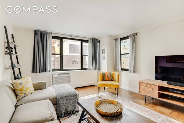 Beautiful high floor Jr. 4, converted two bedroom apartment with south west views in the most ideal midtown east location.
