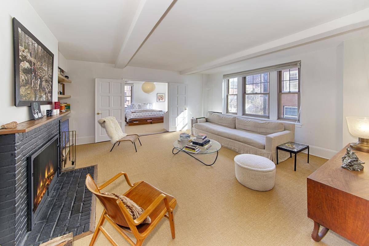 Beautiful North East corner one bedroom condo with great light and views of brownstone gardens, Greenwich Village and the Empire State Building.