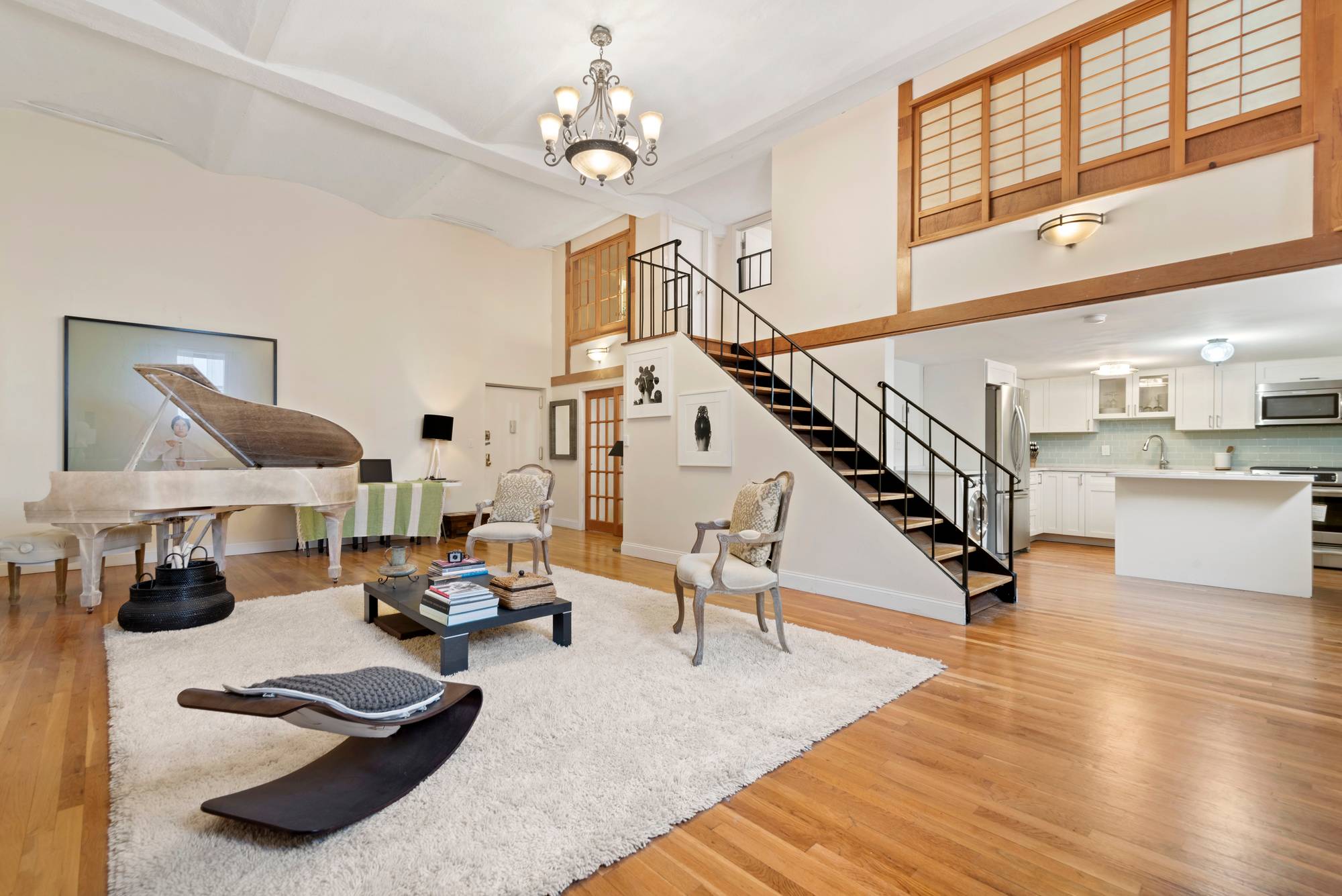 Magnolia Mansion is an 1800's school house converted to luxury condominium lofts featuring 15 ft ceilings, open design, custom made oversized windows and an expansive 35 x 108 courtyard common ...
