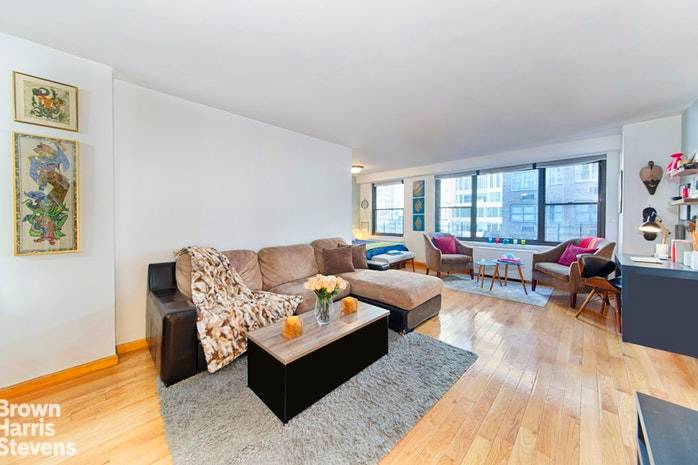 Welcome Home ! Spacious, sun filled alcove studio in an impeccably located full service condo !