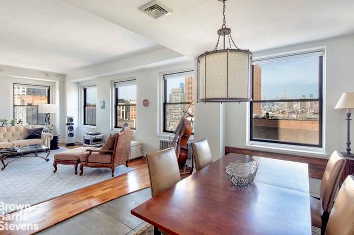 Enjoy fabulous light and stunning skyline views in one of Tribeca's most well loved prewar condominiums !